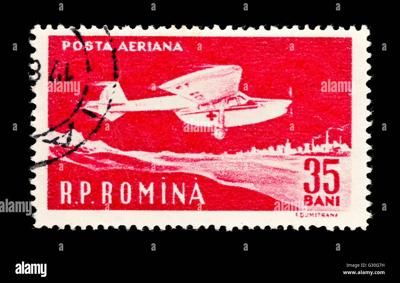 Airmail postage stamp from Romania depicting an airplane Stock Photo