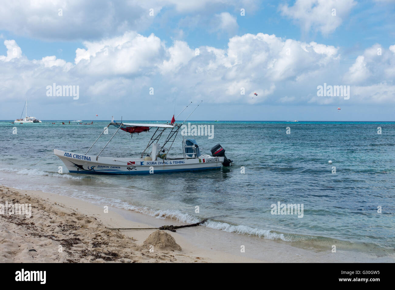 Dive boat ashore at Playa Mia Resort.  Cozumel, Mexico Stock Photo