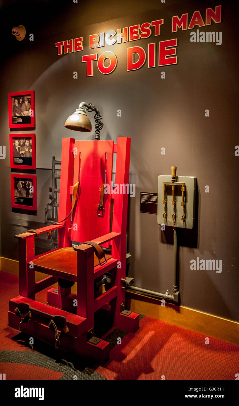 A replica electric chair at the Las Vegas Mob Museum of organized crime in America w / history of notorious gangsters + mobsters Stock Photo