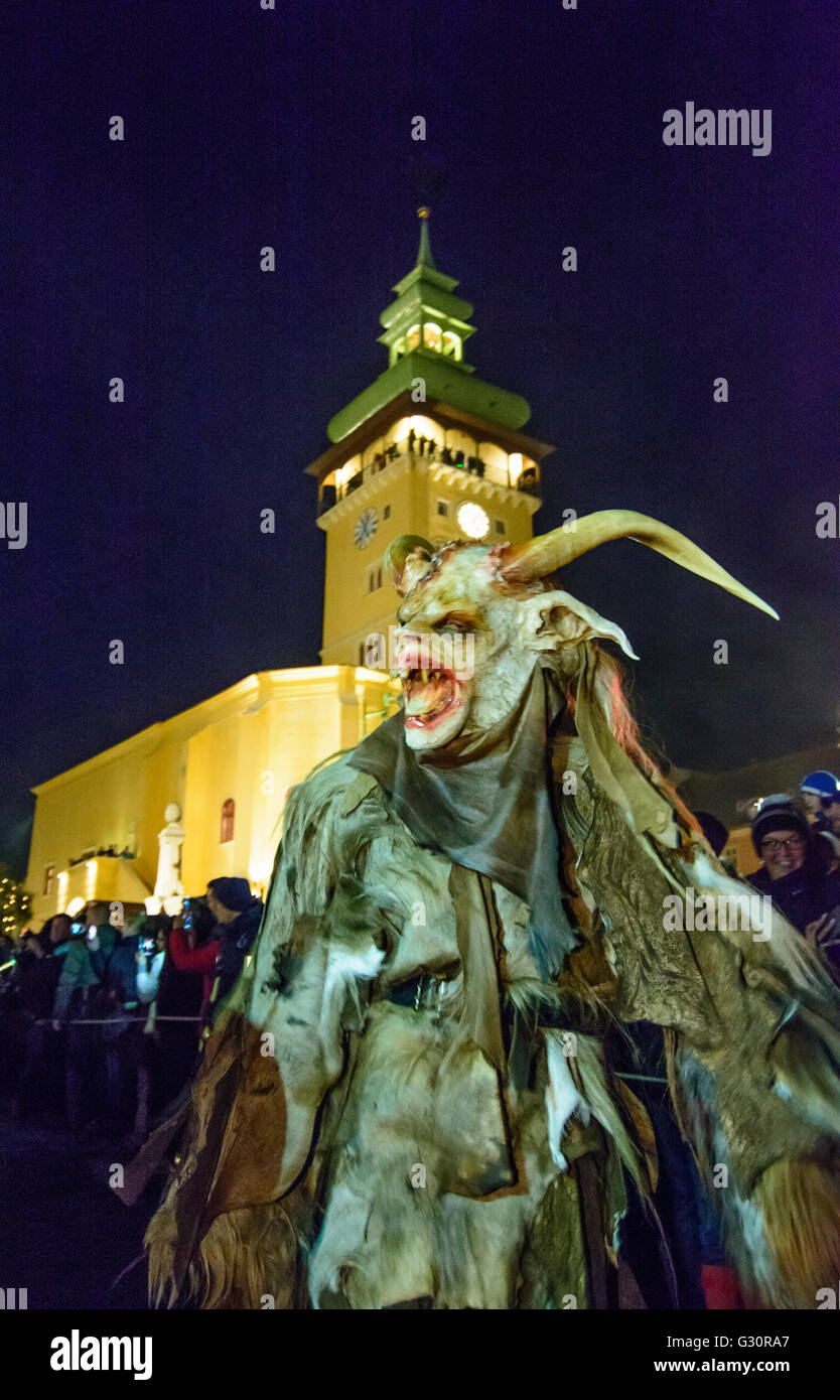 Perchtenlauf (mask procession) with Krampus in the main square in front of City Hall, Austria, Niederösterreich, Lower Austria,  Stock Photo