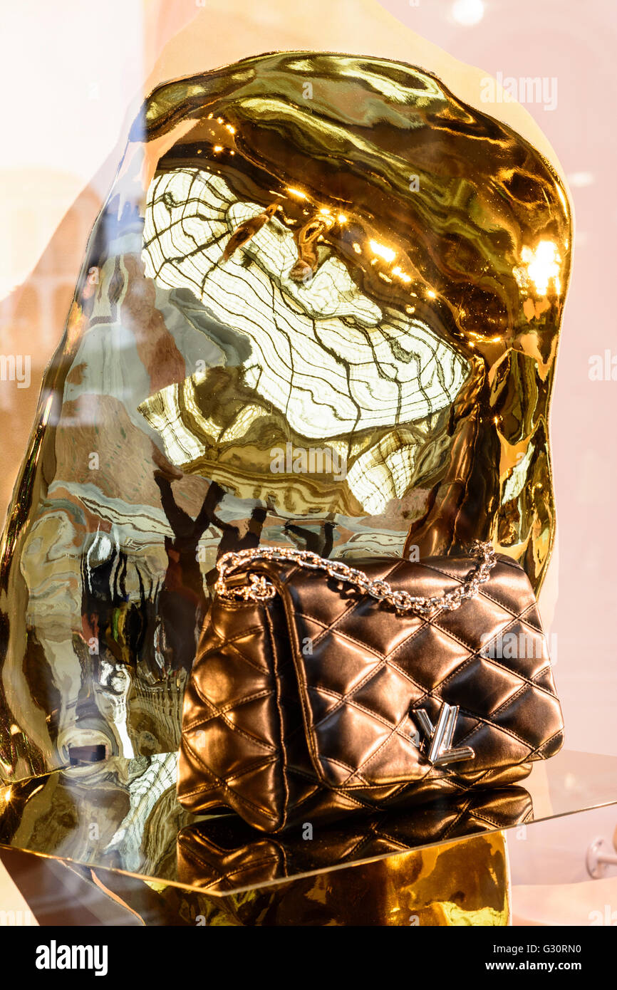 Galleria Vittorio Emanuele II : handbag of Louis Vuitton and mirroring the Galleria, Italy, Lombardei, Lombardy,, Mailand, Milan Stock Photo