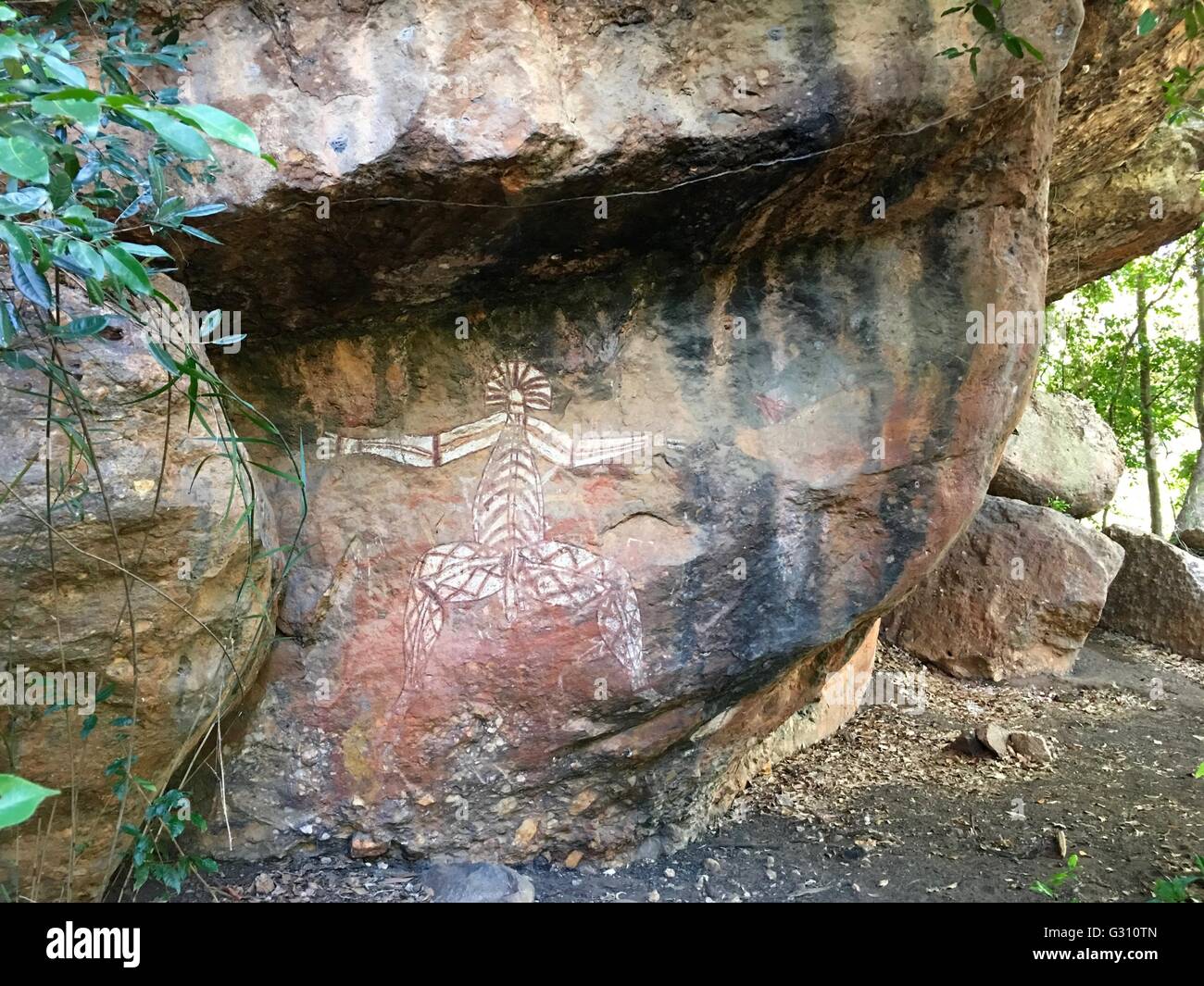 Cave paintings of an Xray figure at Nourlangie Rock (Burrunggui), Kakadu National Park, Northern Territory, Australia Stock Photo