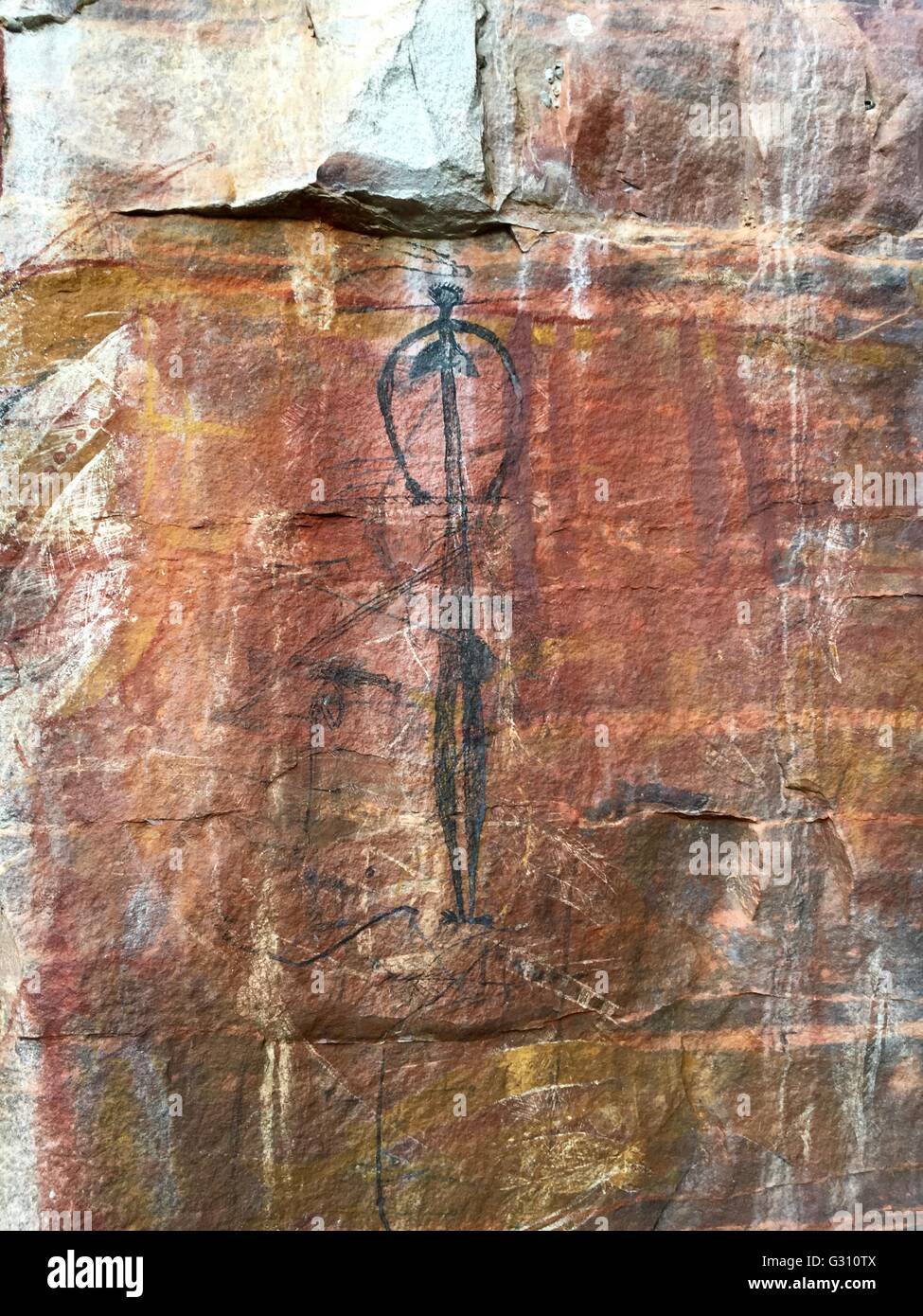 Aboriginal cave painting depicting a female figure in West Arnhem Land, Northern Territory, Australia Stock Photo