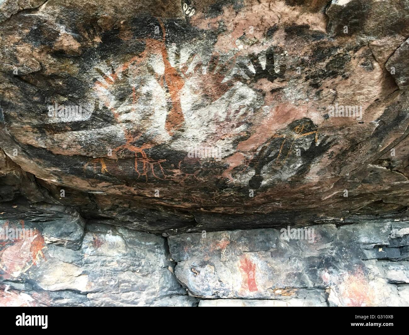 Hand prints at Big Bill's Shelter, named after Big Bill Neidjie, at Kakadu National Park, Northern Territory, Australia Stock Photo