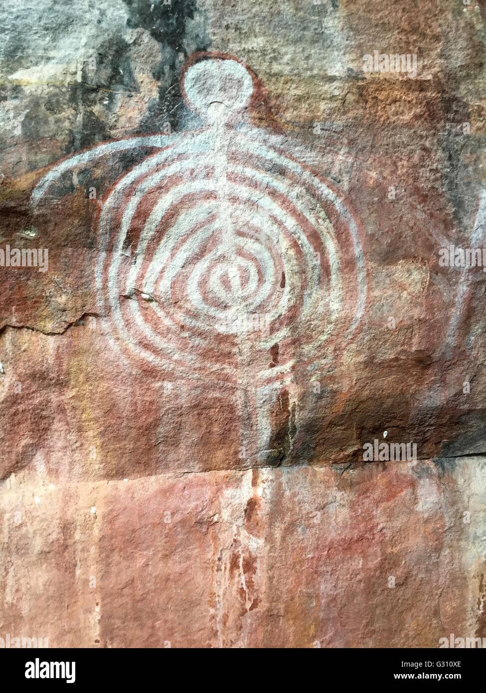 White figure painted right beside the white lady located at the White Lady Dreaming Site, Kakadu National Park, Australia Stock Photo