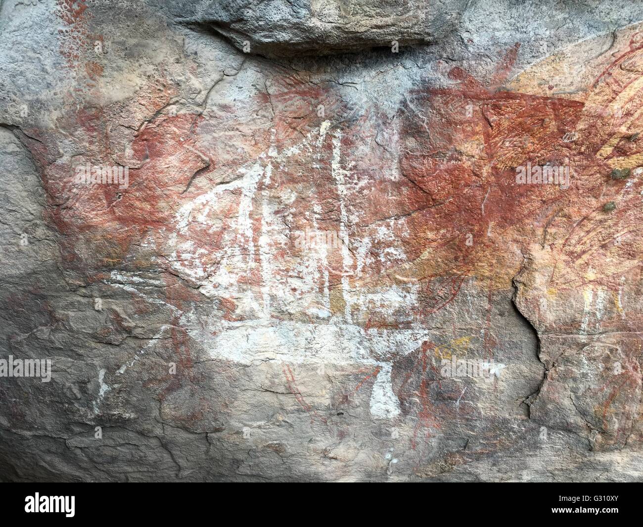 A white sailing vessel known as 'Contact Art' painted at Hawk Dreaming at Cannon Hill, Kakadu National Park, Australia. Stock Photo
