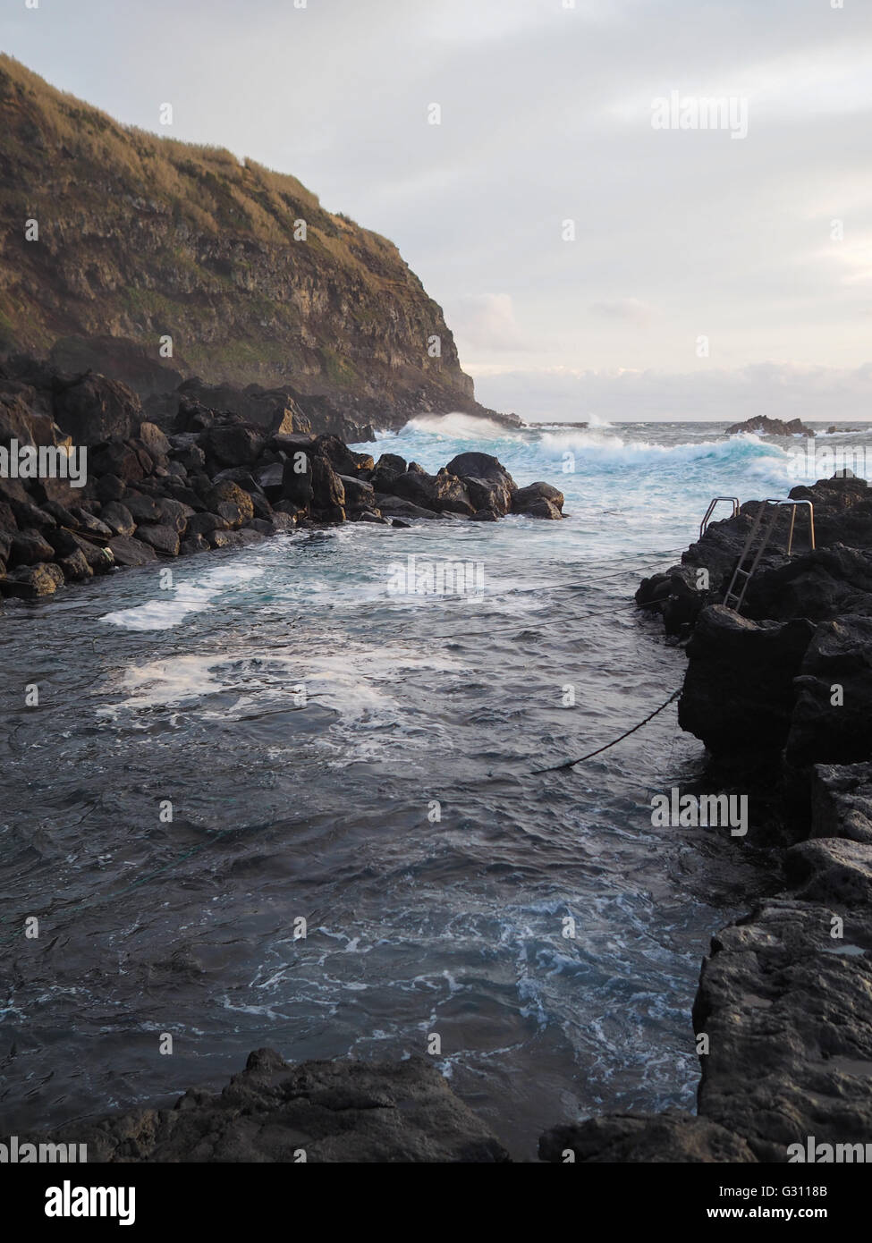 Warm water pool inside the Atlantic Ocean in Ferraria point, Sao Miguel island Stock Photo