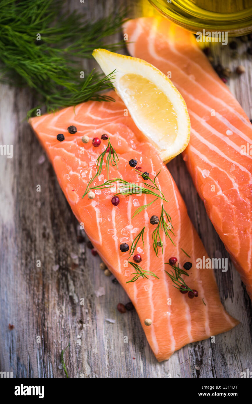 fresh salmon steaks with herbs and spices Stock Photo - Alamy