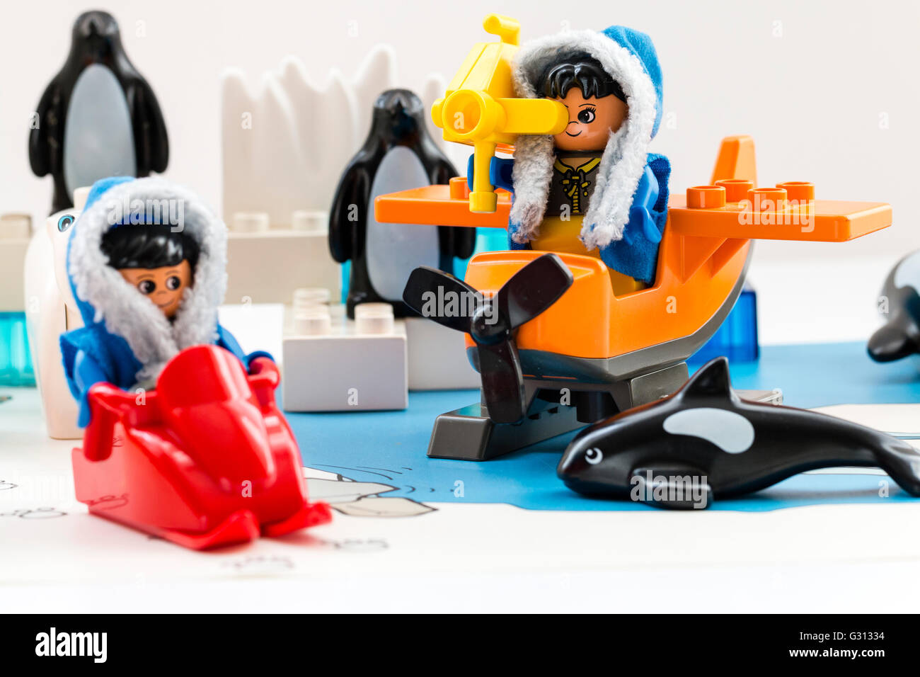 Lego duplo explore Arctic Woman lego figure with ski at base camp with man figure filming. Icebergs, whale and penguins in background Stock Photo - Alamy
