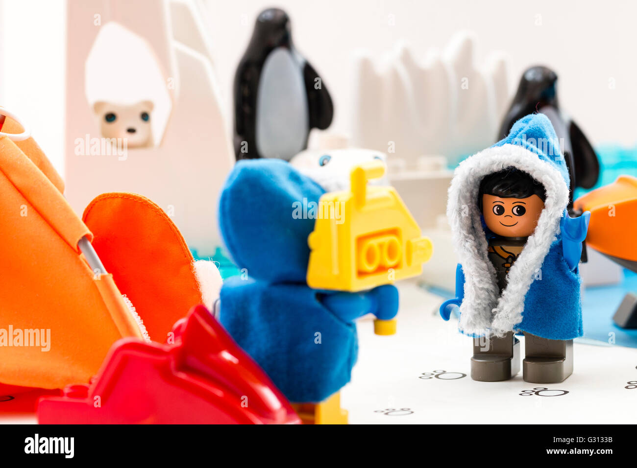 Lego duplo explore Arctic toy playset. Two lego characters, man and woman,  one filming, in base camp, with polar bear, icebergs and penguins behind  Stock Photo - Alamy