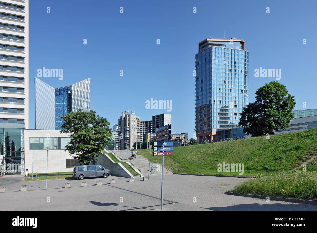 VILNIUS, LITHUANIA - MAY 29, 2016: Column with arrows with the name of all  streets on Constitution Avenue. On a background - th Stock Photo