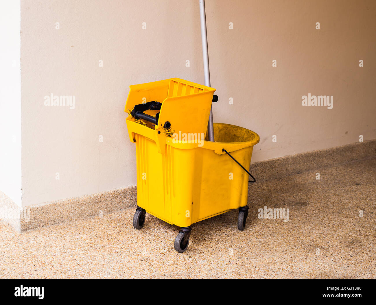 Mop bucket on cleaning in process indoor Stock Photo Alamy