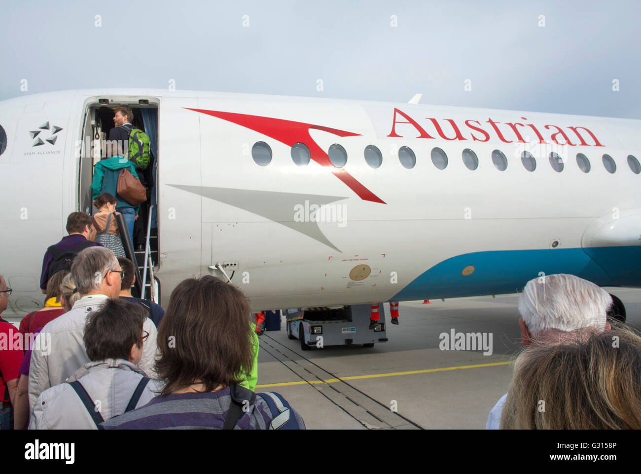 Boarding an airplane at Leipzig Airport, Germany. Stock Photo