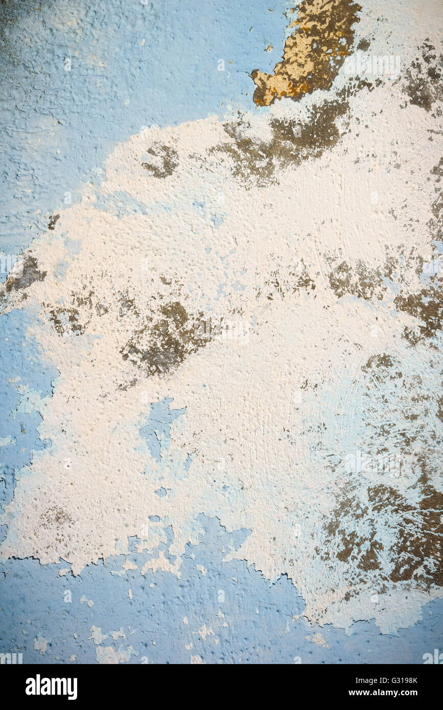 Piece of blue wall with plaster as a background Stock Photo