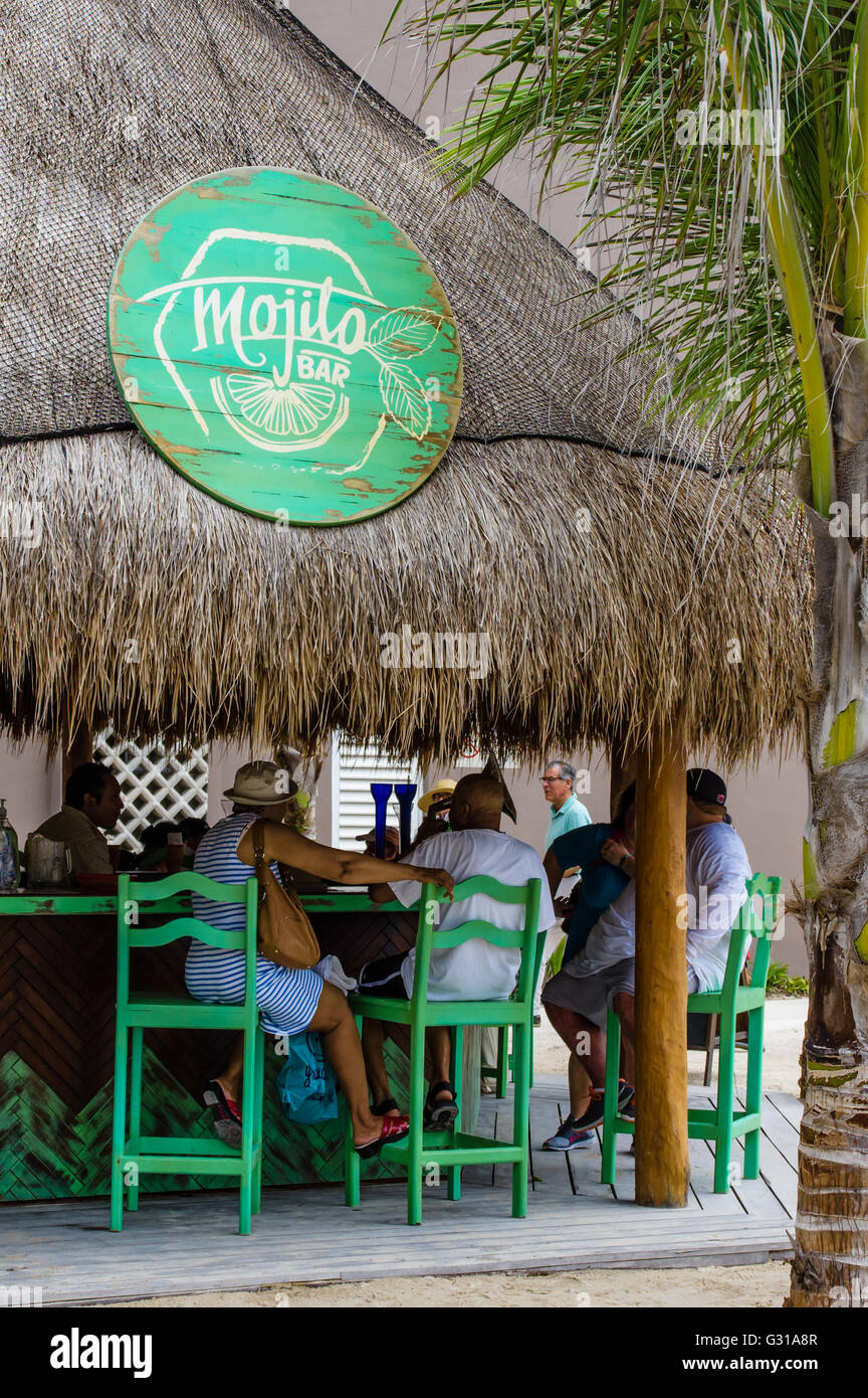 Tourists drinking in the Mojito Bar in Costa Maya, Mexico Stock Photo