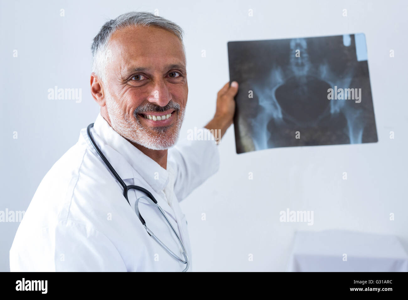 Male doctor holding x-ray Stock Photo
