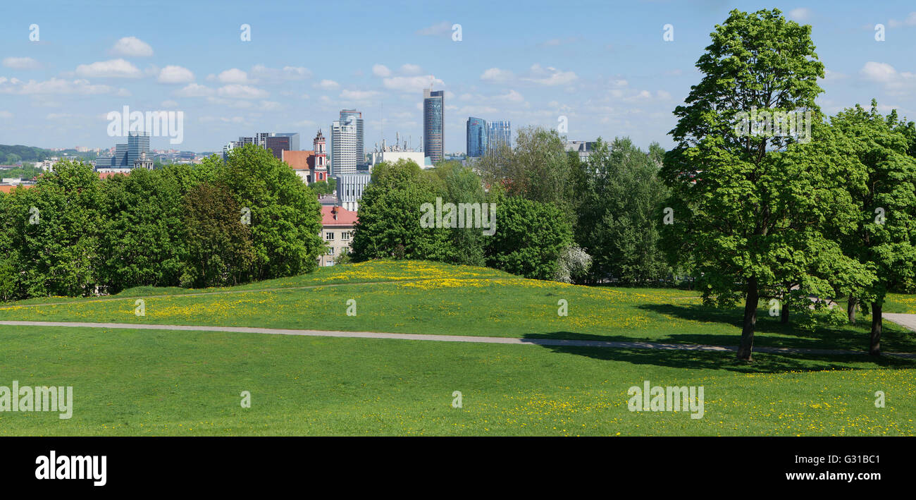 VILNIUS, LITHUANIA - MAY 12, 2016: Panorama of the spring sunny public garden on top of the old historical Lithuanian Tauras mou Stock Photo