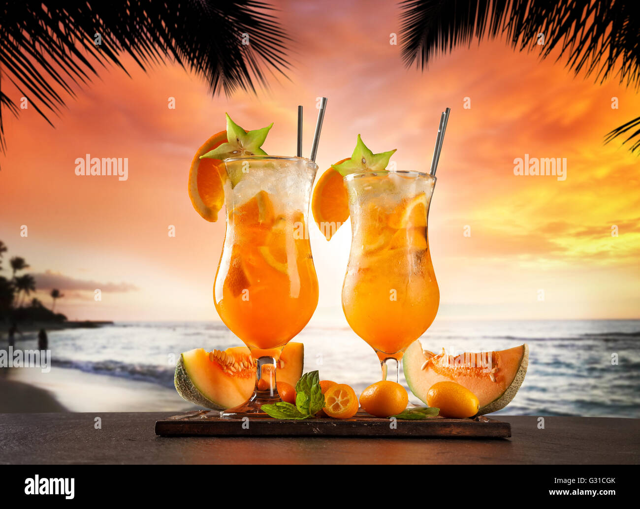 Summer cocktails with blur beach on background Stock Photo