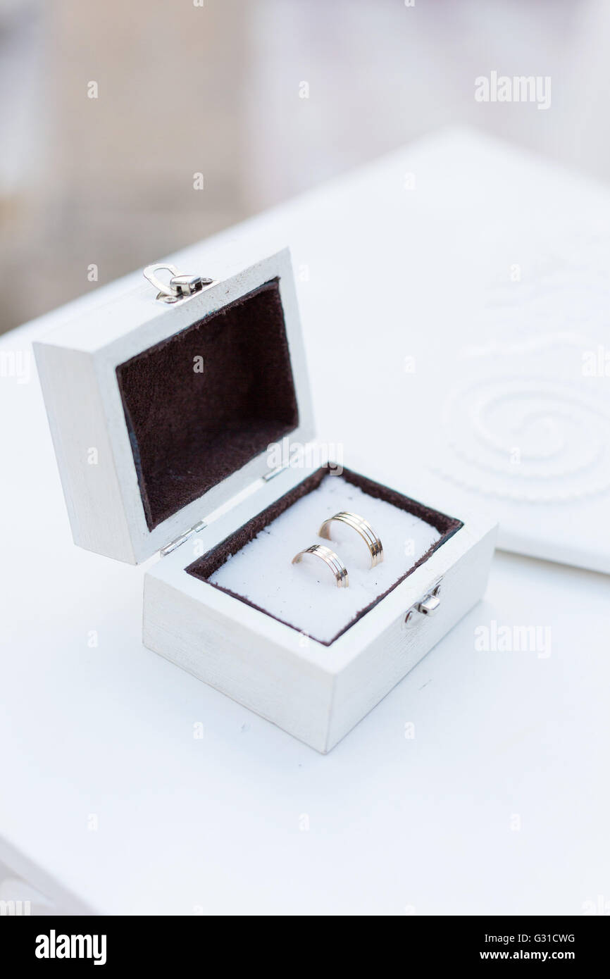Gold wedding rings in a box Stock Photo Alamy