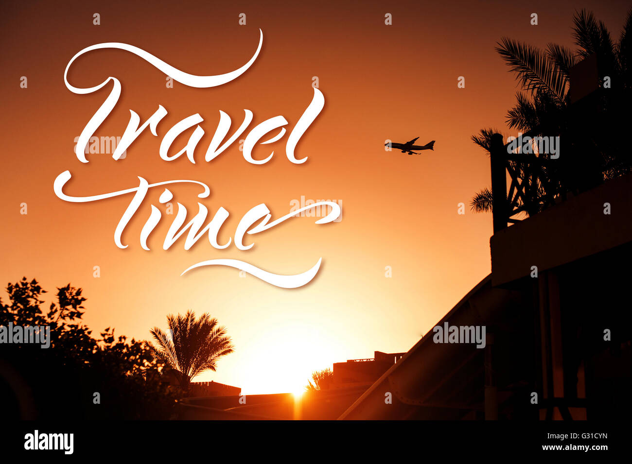 silhouette airplane above tropical resort in Egypt and words Travel time Stock Photo
