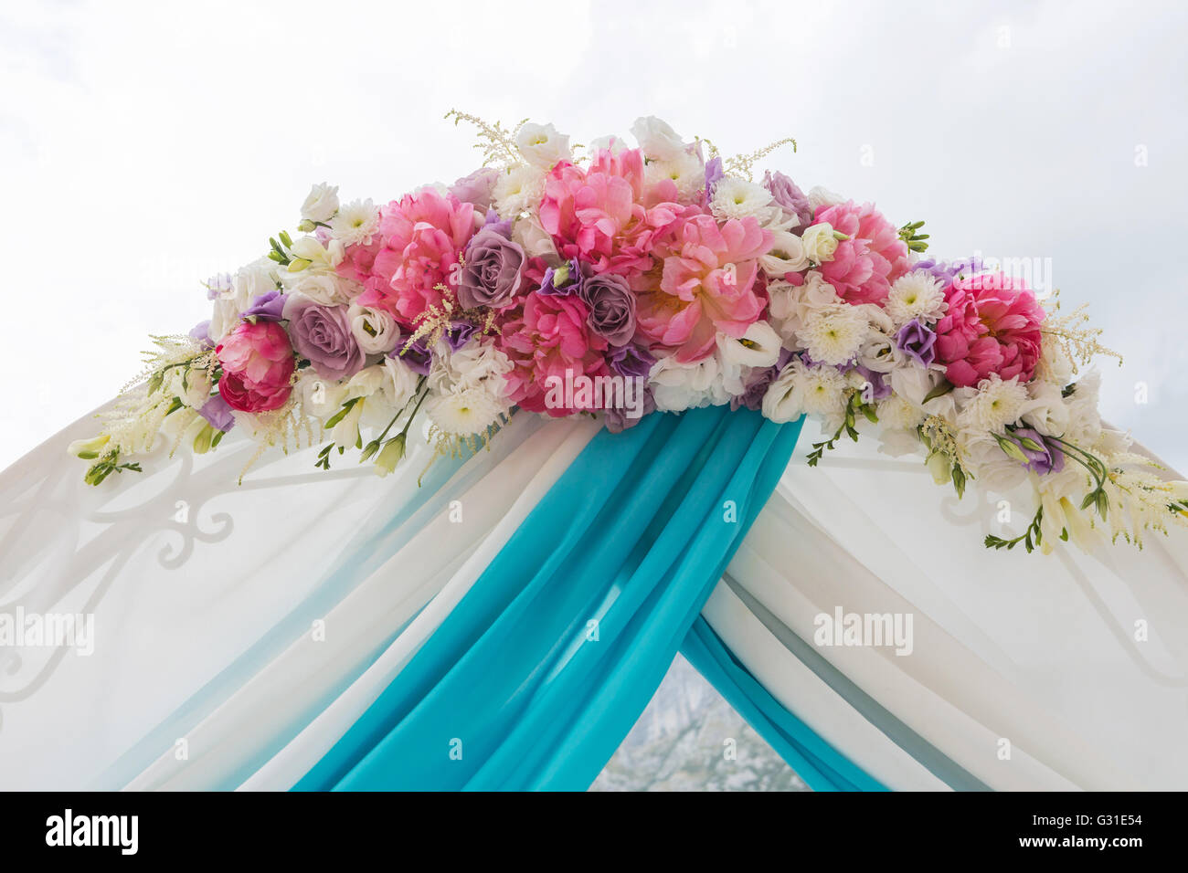 wedding arch for the ceremony of flowers. Stock Photo