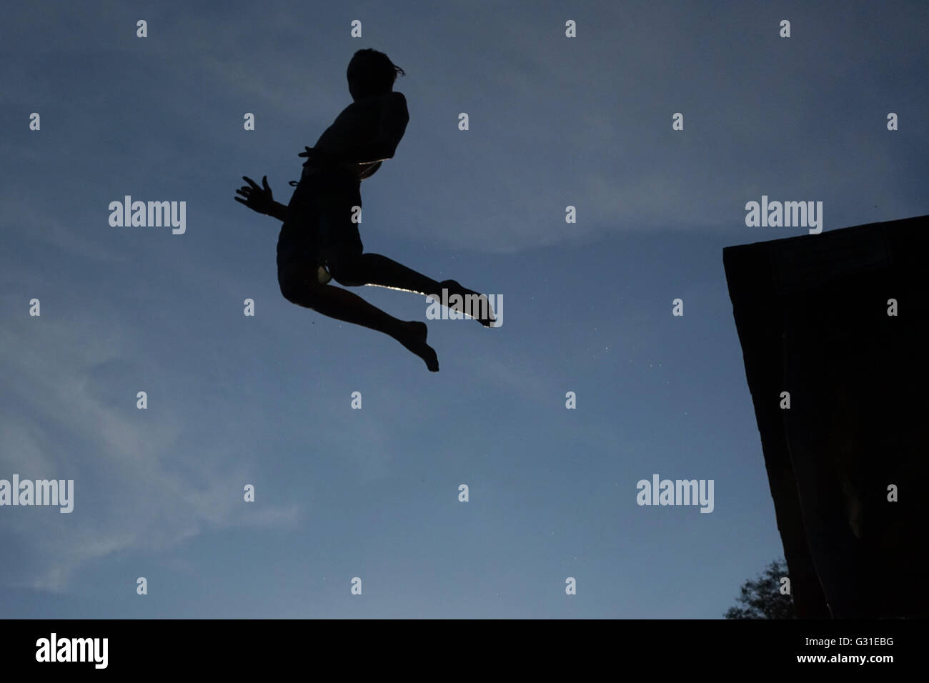 Briescht, Germany, Silhouette, Boy jumping in the air Stock Photo