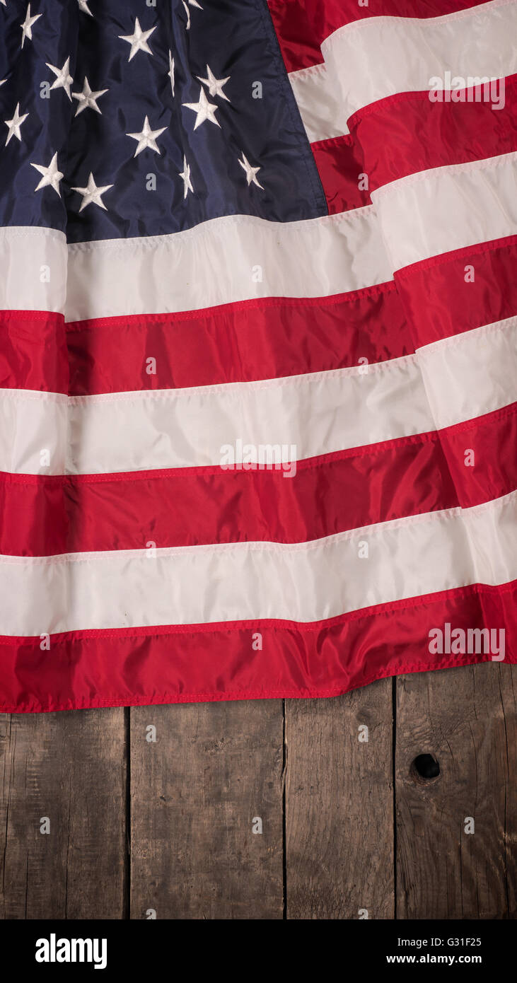 American flag on an old used rustic wood background Stock Photo - Alamy
