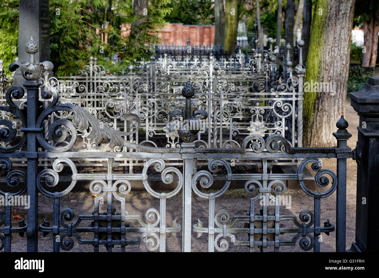 Berlin, Germany, wrought-iron grave borders in the cemetery of Trinity Church Stock Photo