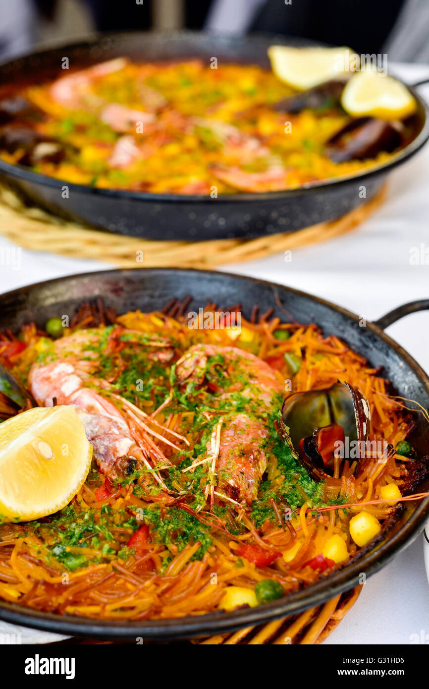 a spanish fideua, a typical noodles casserole with seafood Stock Photo -  Alamy