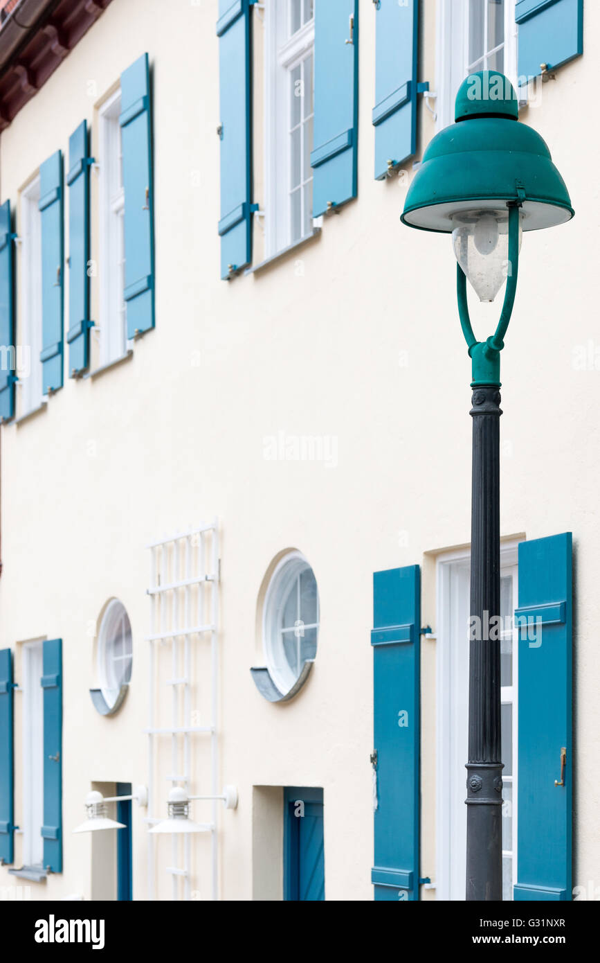Noerdlingen, Germany, lantern in front of a house facade with window shutters Stock Photo