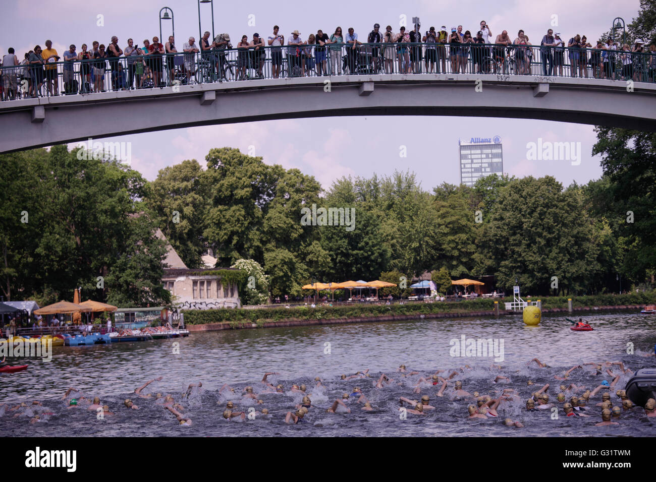 10 th edition of the Berlin Triathlon, which start with the disciplin of  swimming around the  Isle of Youth in Tretowerpark. After, the competitors takes the bicycles and start the 38 kilometer bike course which runs along the Plänterwald . Then they run 10,25 km. Other categories have shorter distances. Stock Photo