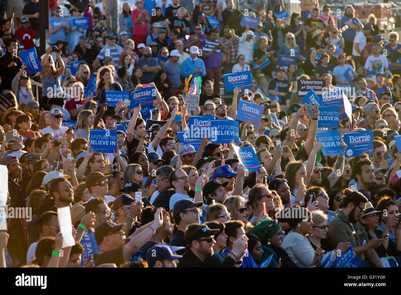 Bernie supporters with signs at the Bernie Sanders rally in San Diego ...