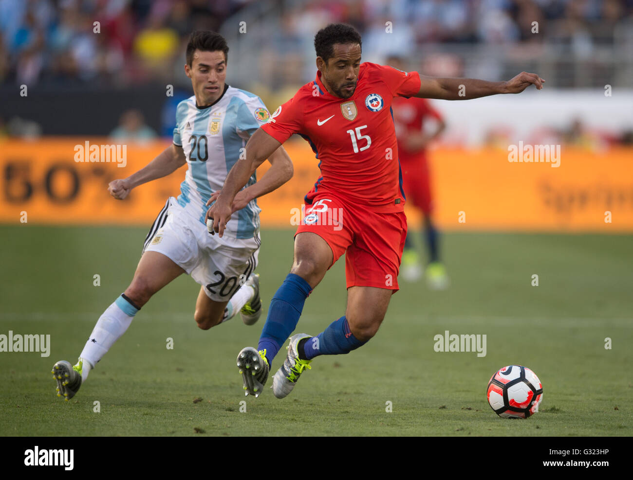 Santa Clara, USA. 6th June, 2016. Chile's Jean Beausejour (R) vies for the ball during the Copa America Centenario Group D match between Argentina and Chile at the Levi's Stadium in Santa Clara, California, the United States, June 6, 2016. Argentina won by 2-1. Credit:  Yang Lei/Xinhua/Alamy Live News Stock Photo
