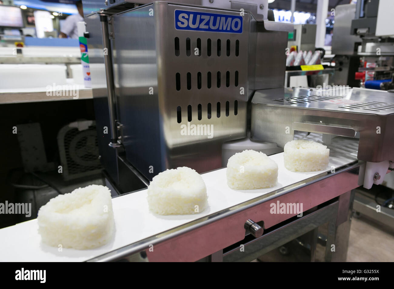 A rice ball machine maker on display at the International Food Machinery & Technology Exhibition