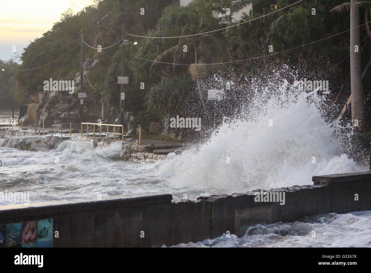 Sydney, Australia. 06th June, 2016. Waves crash onto Marine Parade, the walkway from Manly Beach to Shelly Beach, which has been severely damaged in the storms. Credit:  Max Crane/Alamy Live News Stock Photo