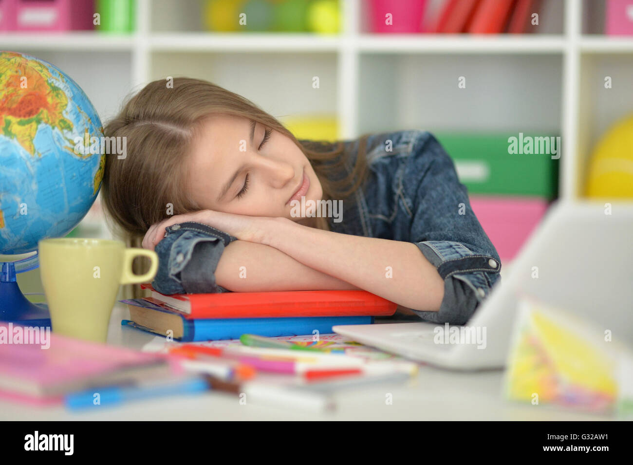 student girl sleeping on books Stock Photo - Alamy