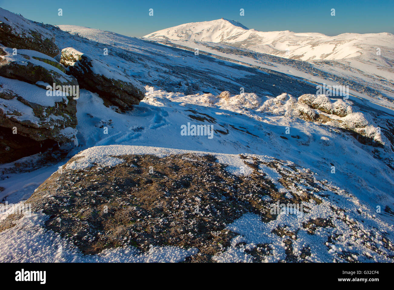 Winter Carpathian mountains; rock and a morning light Stock Photo