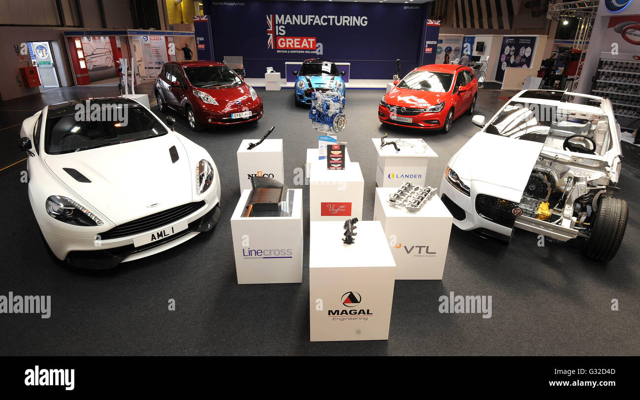 (left to right) British built cars Aston Martin Vanquish, Nissan LEAF, MINI, Vauxhall Astra Sports Tourer and Jaguar XF (cutaway) on display at the inaugural Automechanika Birmingham trade show at the NEC, which starts today. Stock Photo