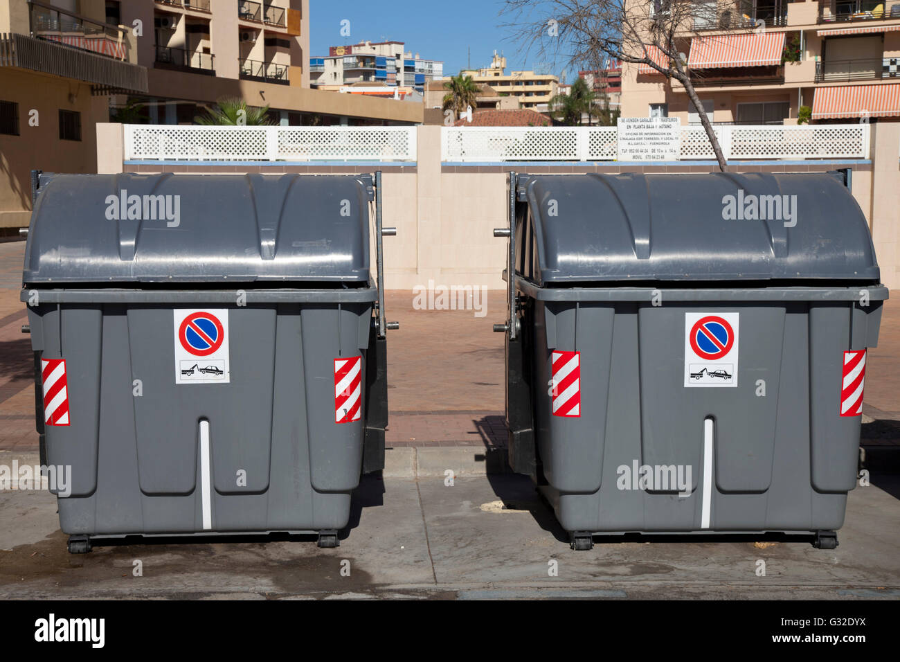 Wheeled trash cans standing on the roadside, Fuengirola, Costa del Sol
