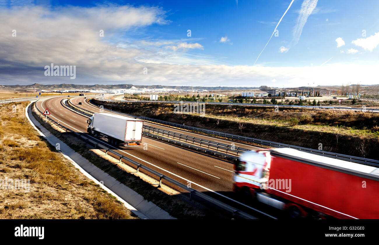 International forwarding.Trucks carrying goods and highway Stock Photo