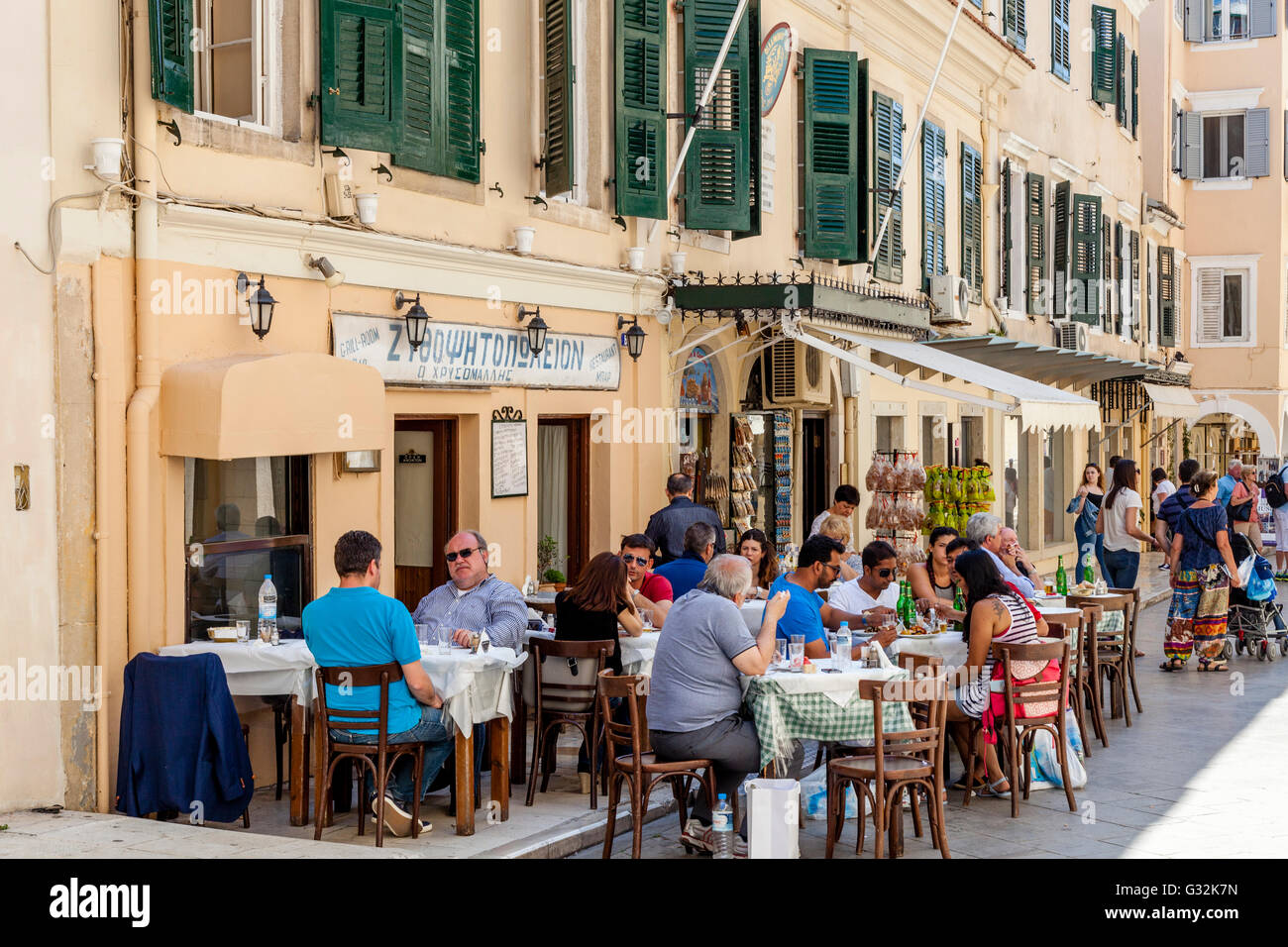 People Eating At A Restaurant In Corfu Town, Corfu Island, Greece Stock