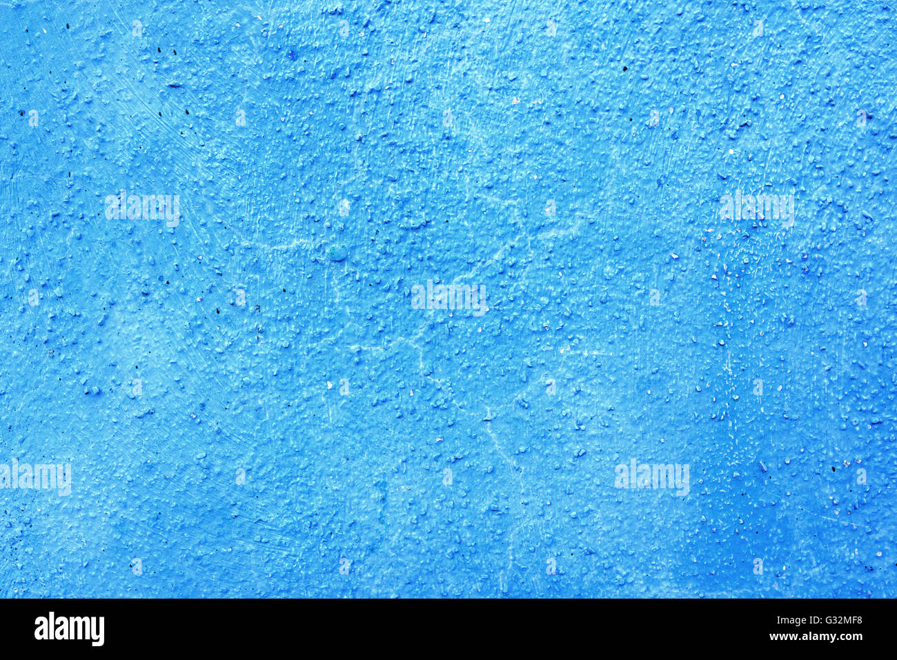 Piece of blue wall with plaster as a background Stock Photo