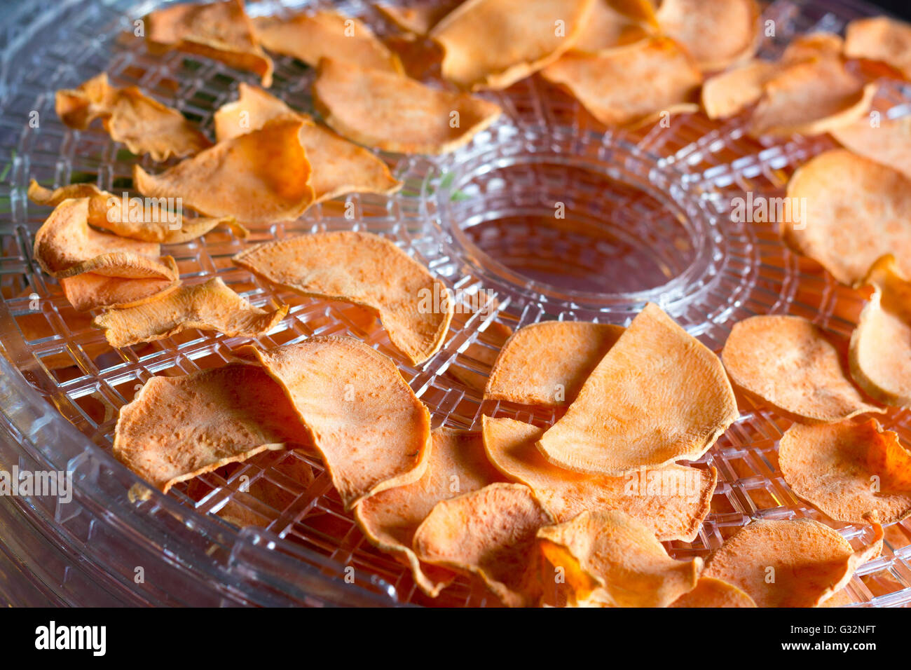 Sweet Potato Chips Dehydrating Closeup Stock Photo - Alamy