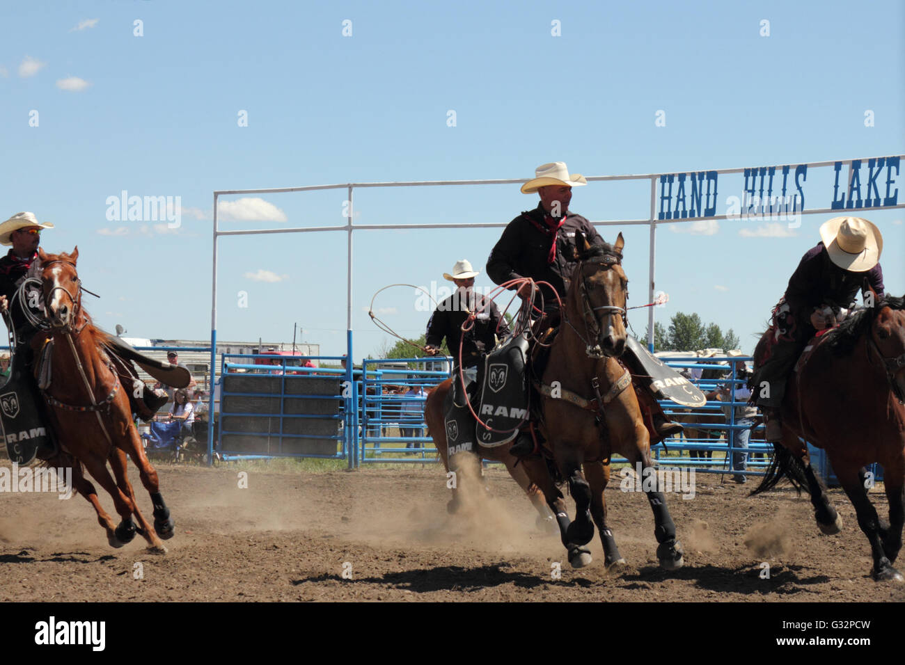 Cowboys in a rodeo in Alberta, Canada Stock Photo