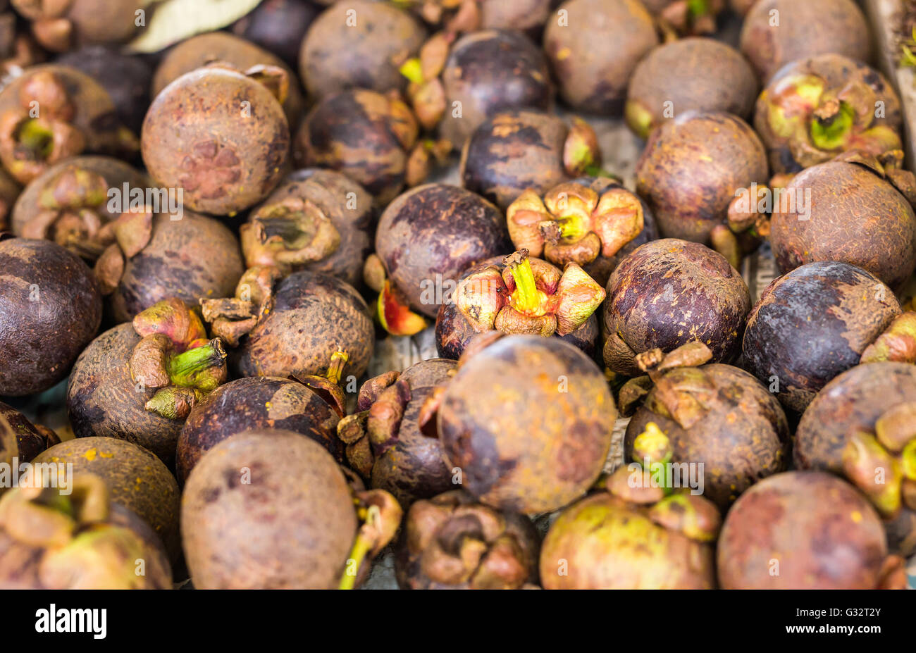 Fresh mangosteen for sale at an outdoor market Stock Photo Alamy