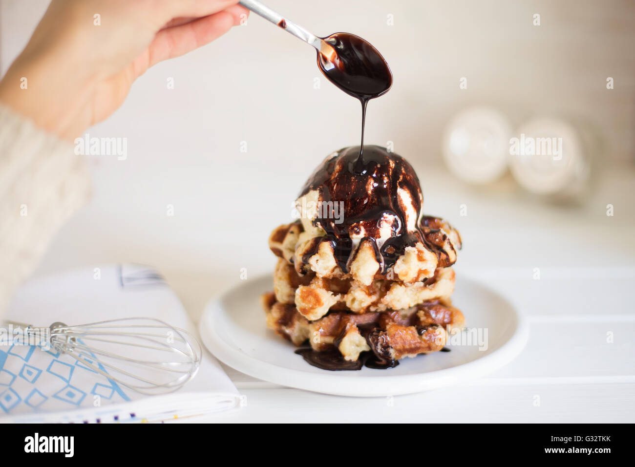 Stack of Waffles with ice cream and hot chocolate sauce Stock Photo Alamy