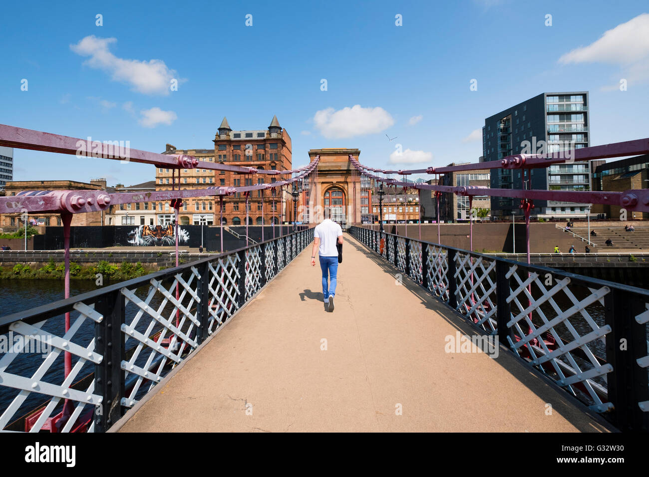 South Portland Street Suspension footbridge crossing River Clyde in Glasgow United Kingdom Stock Photo