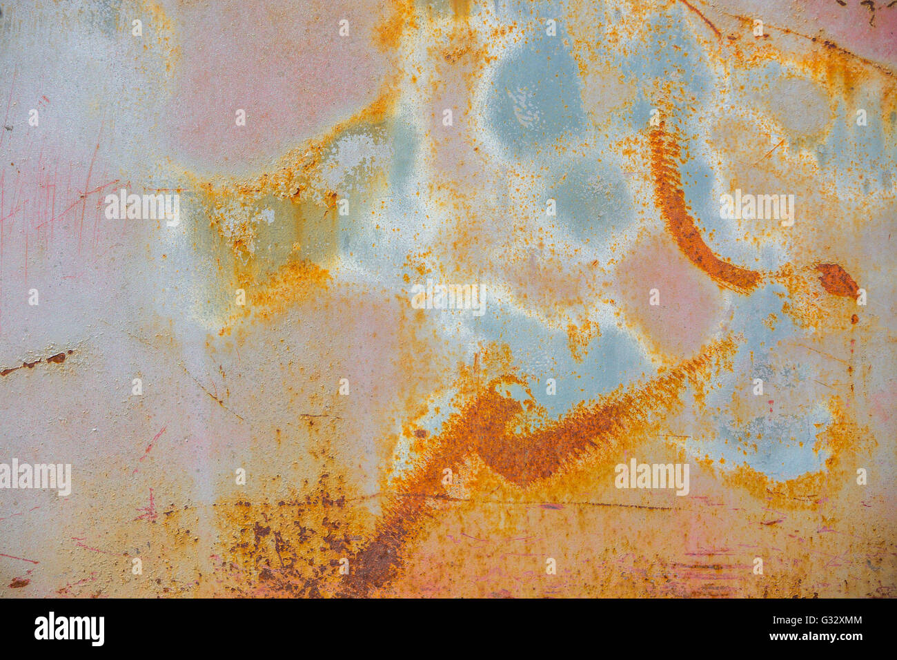 a detail of the side of a above ground gas tank.  Image looks like an abstract paintings Stock Photo
