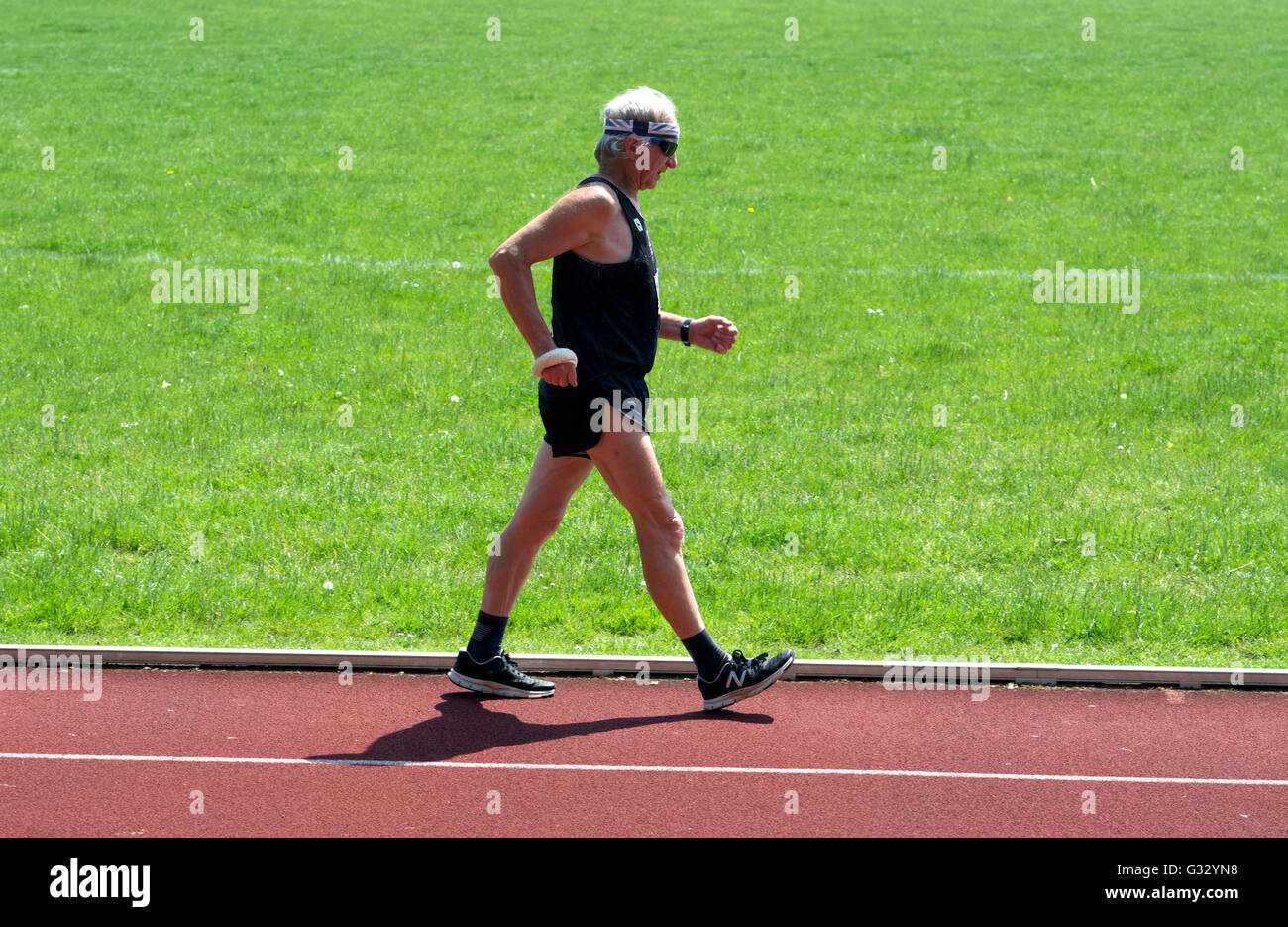 Masters athletics UK. Male athlete in a walking race Stock Photo Alamy
