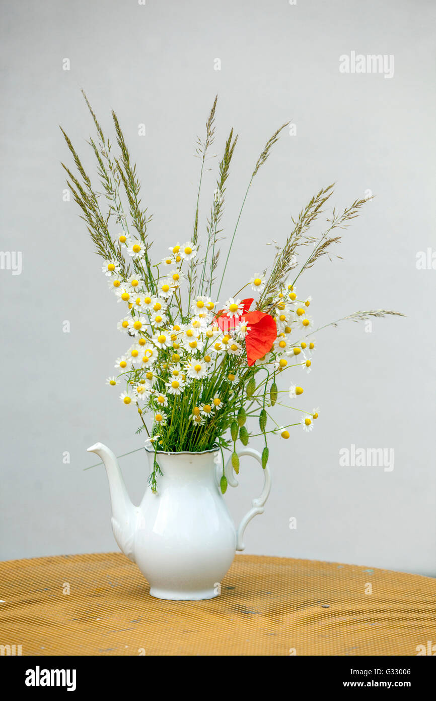 Bouquet of meadow flowers in a vase Stock Photo
